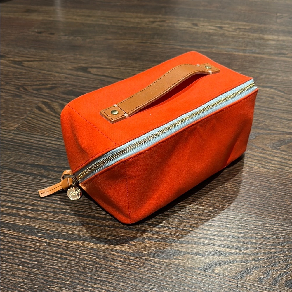 Clare V Vacances toiletry bag, tangerine canvas